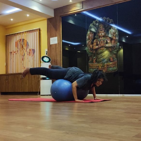 image of client doing yoga