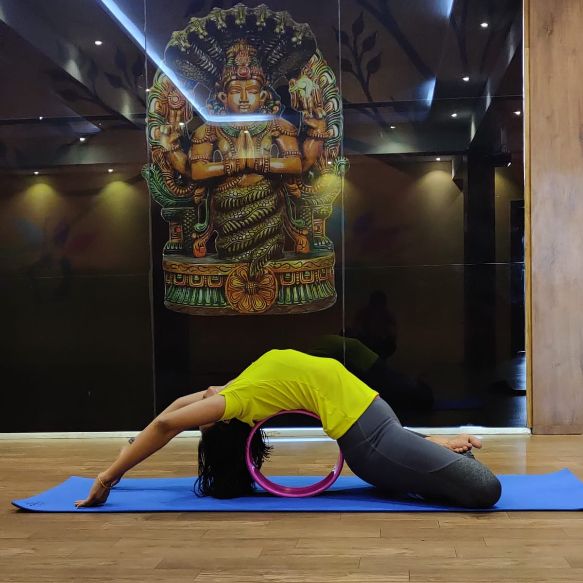 image of client doing yoga