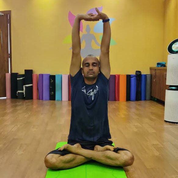 image of client doing yoga