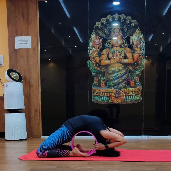 image of client doing yoga