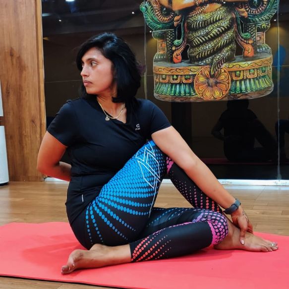 image of client doing yoga